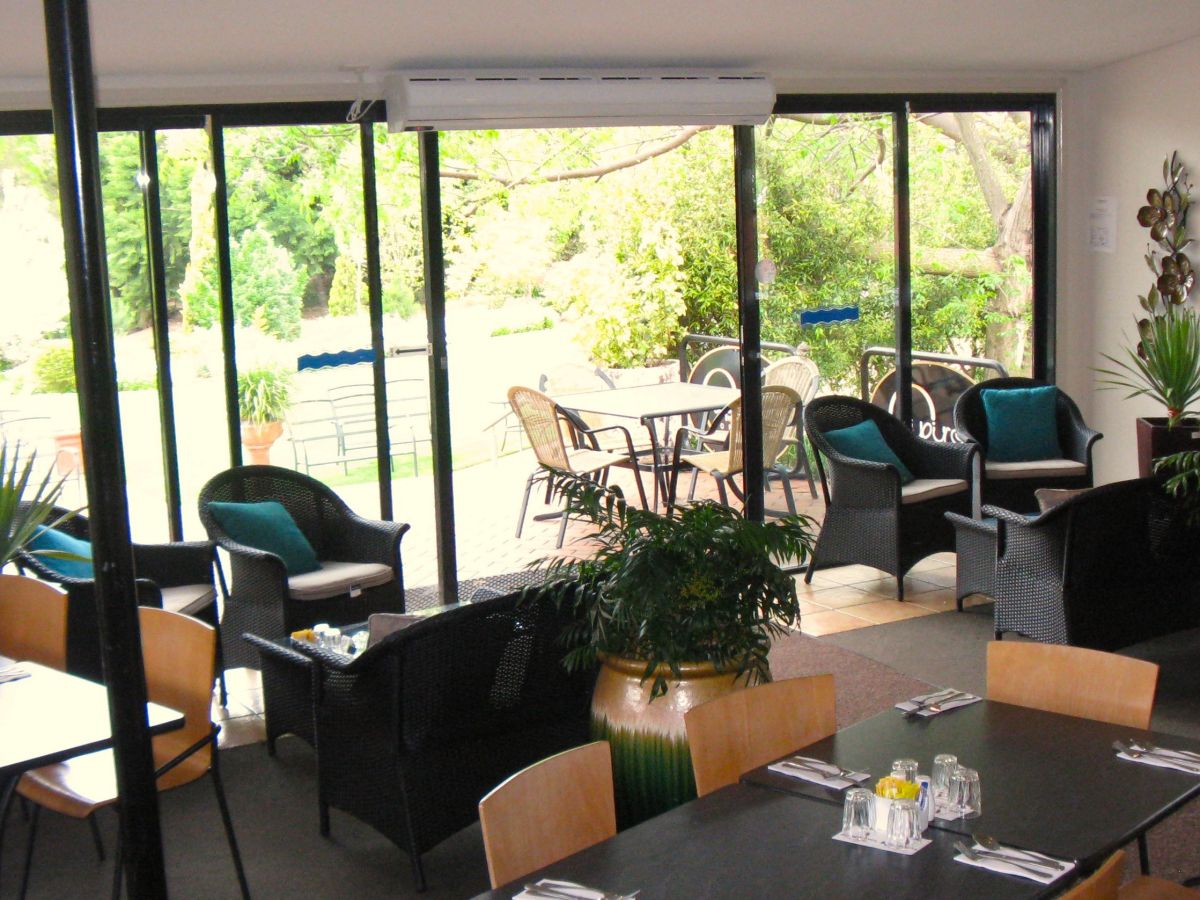 A commercial air curtain on the interior door of a restaurant maintaining air circulation