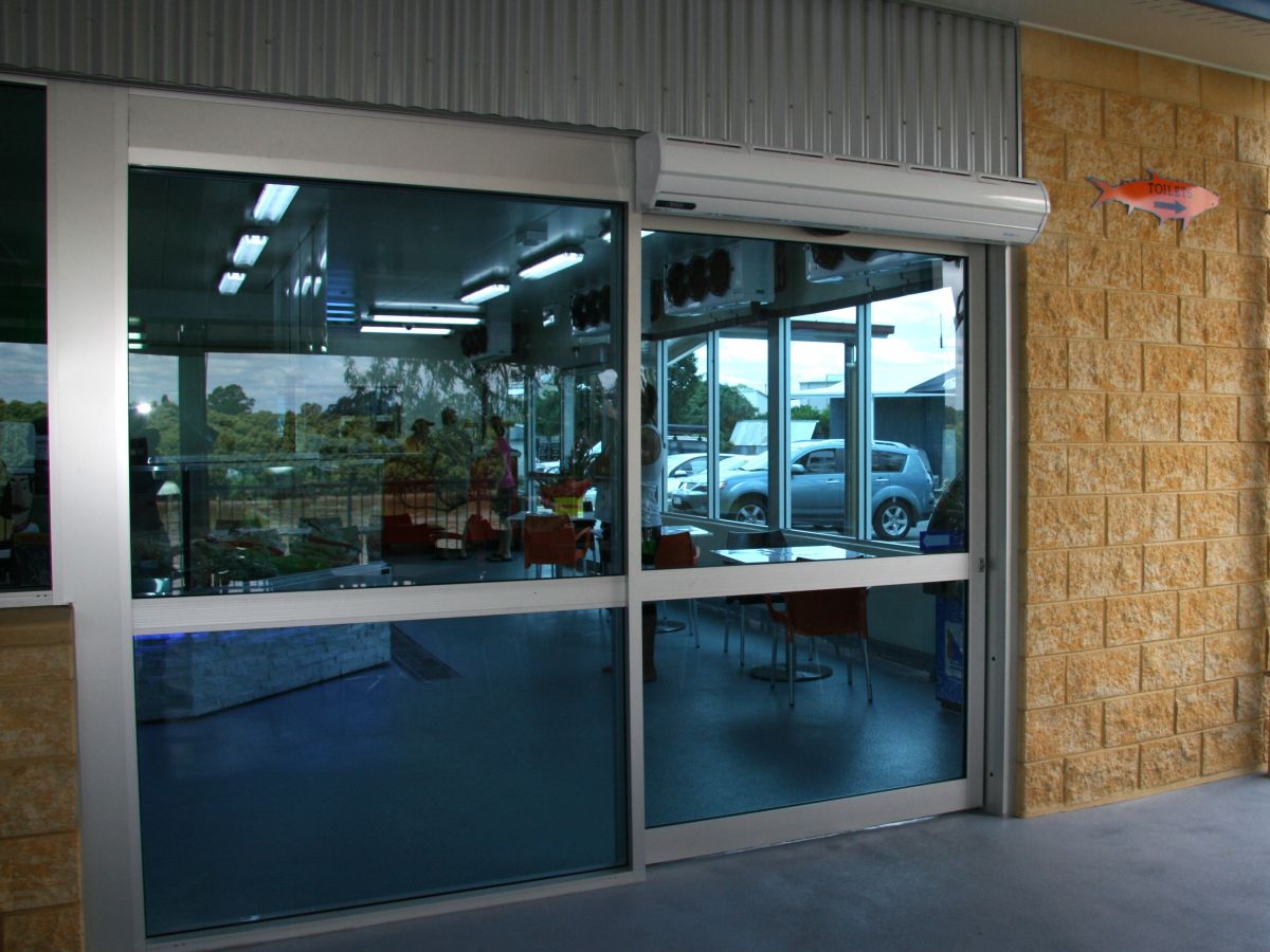 Concealed commercial air curtain on the exterior automatic sliding door of Grunskes Bundaberg minimising air transfer