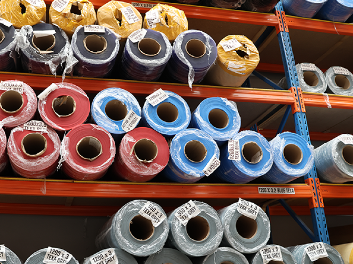 Bulk PVC material rolls in a warehouse - High grade in various widths, thickness, grades and colours used for PVC Strip curtains, strip door curtains, cool room strip curatins.